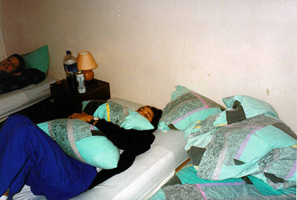 If Rok is taking a photo and Katja is there on a bed.  Who is making Slodi so happy??